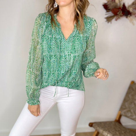 Blouse verte et lurex doré aux manches longues et petit col V avec finition volants