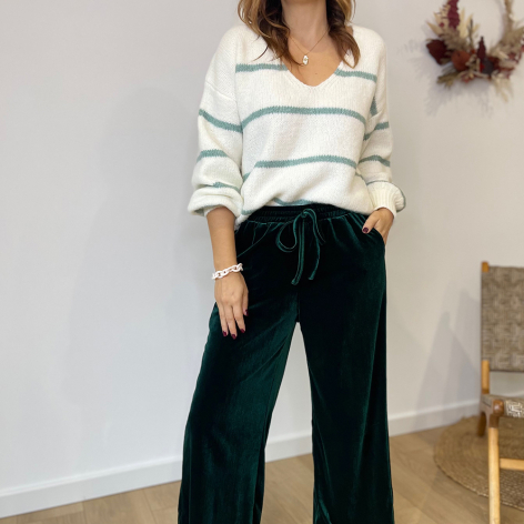 Pantalon large et fluide en velours vert avec la taille élastique